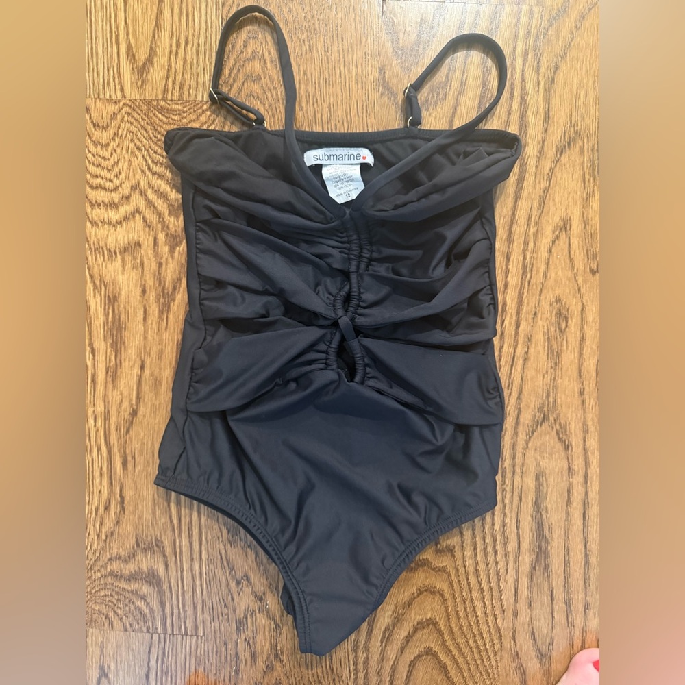 submarine swimsuit with adjustable straps. Runs a bit small